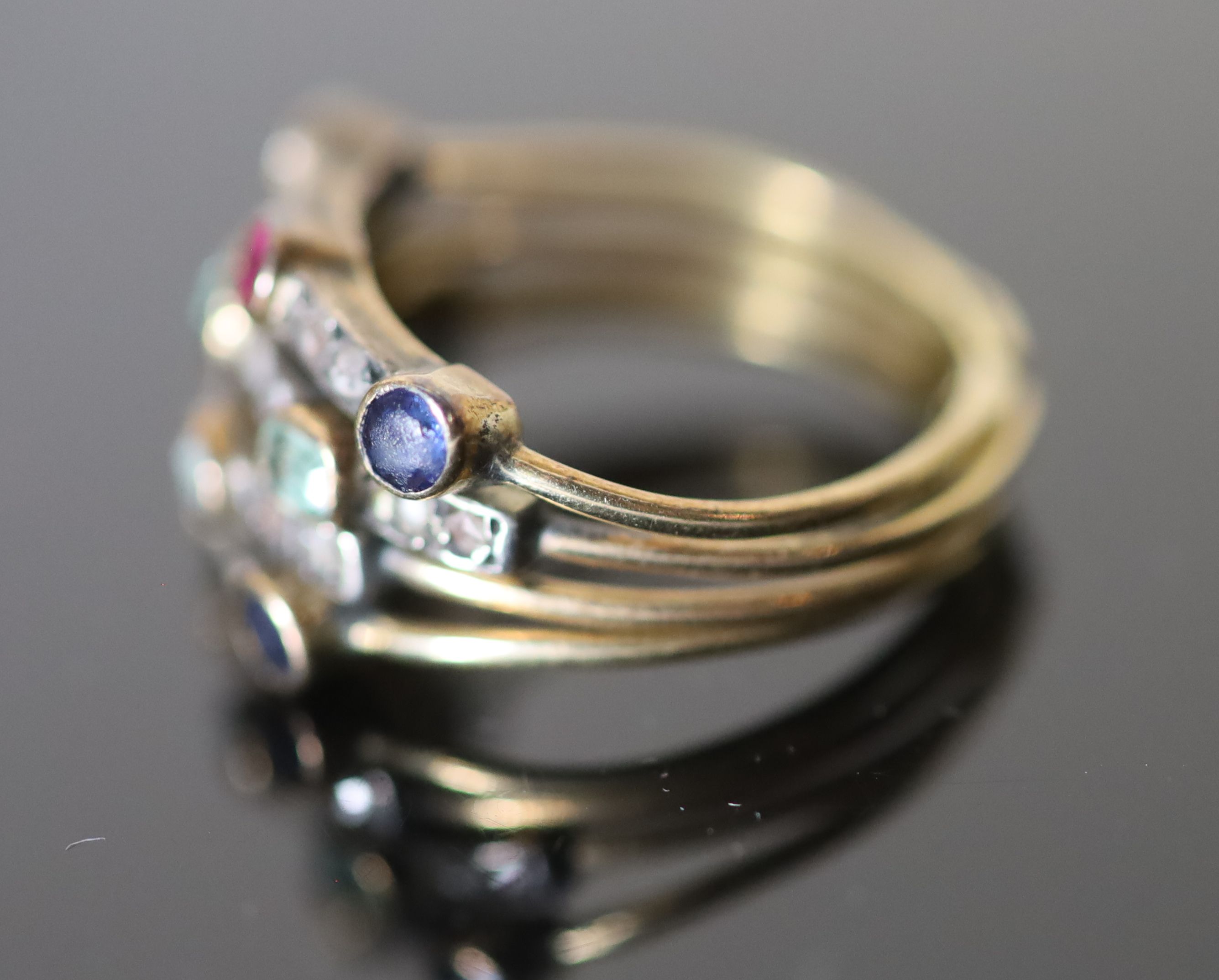 A 19th century gold, sapphire, ruby, emerald and rose cut diamond set quadruple shank half hoop ring,